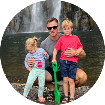 Philip Mundy outdoors with his children